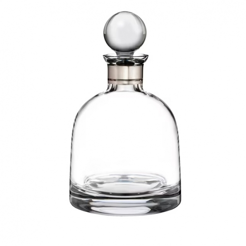 Elegance Short Decanter with Round Stopper   Crafted from the finest luxury crystal
    Durable decanter that’s expertly crafted for your timeless enjoyment
    Contemporary profile delivers a modern aesthetic to your home
    Highlights the rich hues of your favorite Whiskey or Brandy
    A timeless gift for a whiskey connoisseur

Volume
    37.2 oz